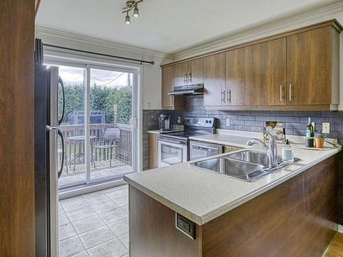 Cuisine - 2492 Rue Adhémar-Raynault, L'Assomption, QC - Indoor Photo Showing Kitchen With Double Sink