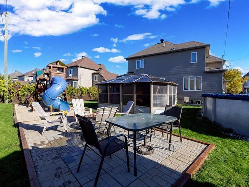 Backyard - 89 Rue Du Ruisselet, Vaudreuil-Dorion, QC - Outdoor With Deck Patio Veranda