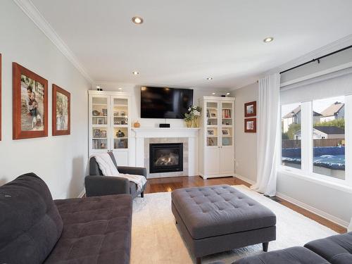 Family room - 89 Rue Du Ruisselet, Vaudreuil-Dorion, QC - Indoor Photo Showing Living Room With Fireplace