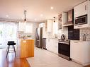 Kitchen - 45 Rue Boyer, Saint-Constant, QC  - Indoor Photo Showing Kitchen With Upgraded Kitchen 