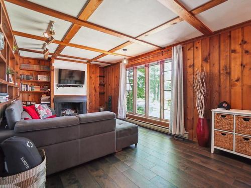 Living room - 385 2E Avenue, Crabtree, QC - Indoor With Fireplace