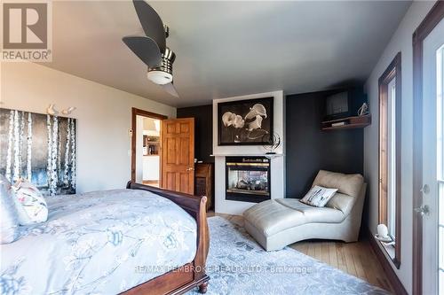 11 Fairway Drive, Petawawa, ON - Indoor Photo Showing Bedroom With Fireplace