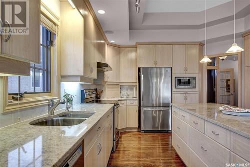 3324 Baneberry Drive, Regina, SK - Indoor Photo Showing Kitchen With Stainless Steel Kitchen With Double Sink