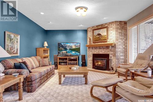 3324 Baneberry Drive, Regina, SK - Indoor Photo Showing Living Room With Fireplace