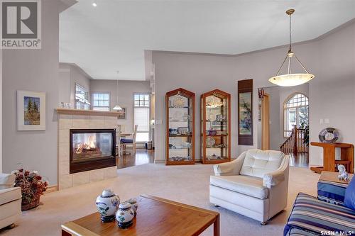 3324 Baneberry Drive, Regina, SK - Indoor Photo Showing Living Room With Fireplace