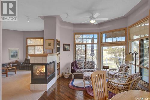 3324 Baneberry Drive, Regina, SK - Indoor Photo Showing Living Room With Fireplace