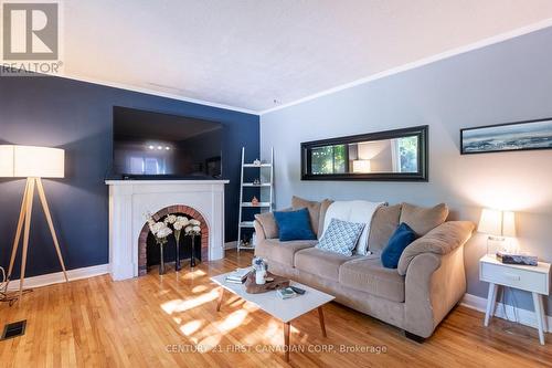 14 Cornish Street, London, ON - Indoor Photo Showing Living Room With Fireplace