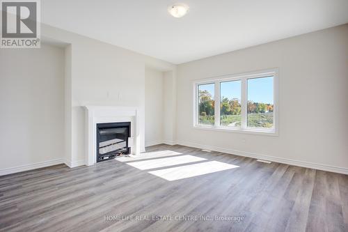 122 Hitchman Street, Brant, ON - Indoor Photo Showing Living Room With Fireplace