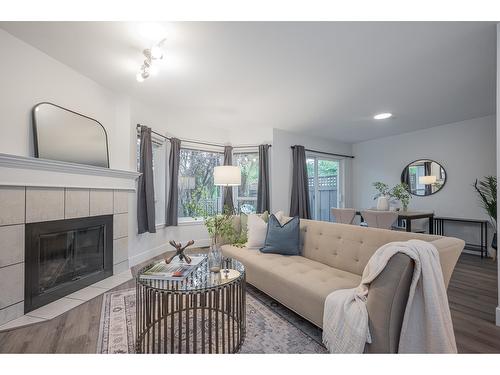 308 16233 82 Avenue, Surrey, BC - Indoor Photo Showing Living Room With Fireplace