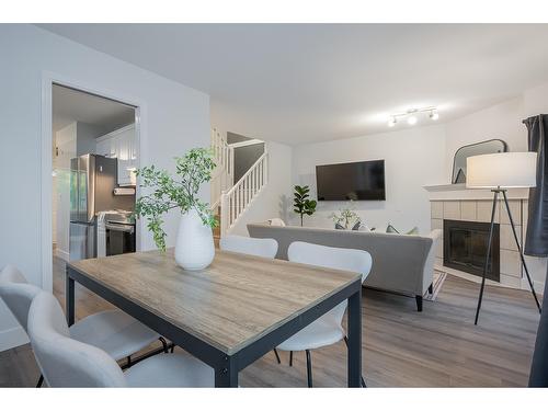 308 16233 82 Avenue, Surrey, BC - Indoor Photo Showing Dining Room With Fireplace