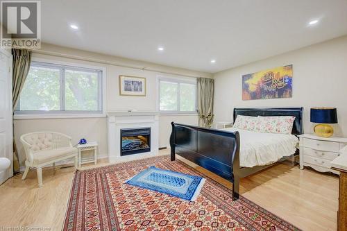 Master Bedroom on 2nd Floor/Upper level - 61 Renwick Avenue, Cambridge, ON - Indoor Photo Showing Bedroom With Fireplace