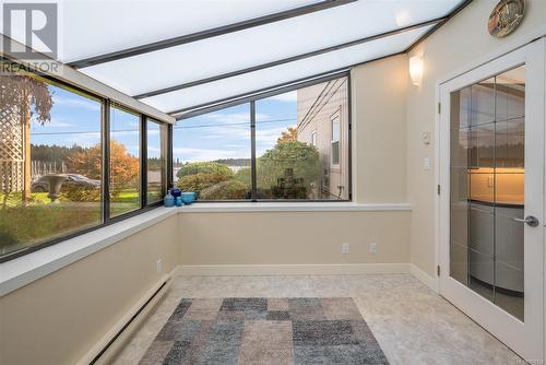 sunroom with  plenty of natural light and ocean View - 101 145 Newcastle Ave, Nanaimo, BC - Indoor Photo Showing Other Room