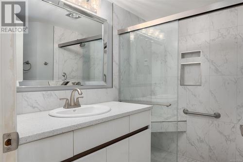 Bathroom featuring vanity and a shower with door - 101 145 Newcastle Ave, Nanaimo, BC - Indoor Photo Showing Bathroom