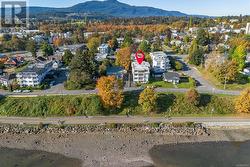 Birds eye view of property featuring a mountain view - 