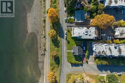 Birds eye view of property featuring a water view - 