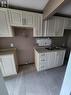 4118 Main Street, Niagara Falls, ON  - Indoor Photo Showing Kitchen With Double Sink 