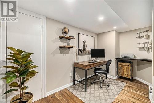 The unexpected office/den w/ storage room and beautiful stone accent wall. One of a kind!! - 126 Code Road, Perth, ON - Indoor Photo Showing Office