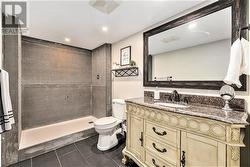 3pc. bathroom. Beautiful shower door and tile will be left for the new homeowner. - 