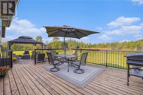 Expansive rear decking. Pressure treated wood and new railing (2018) - 126 Code Road, Perth, ON - Outdoor With Deck Patio Veranda With Exterior