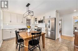 Enjoy your custom kitchen with real wood cabinetry, gleaming backsplash and brand new appliances ! - 