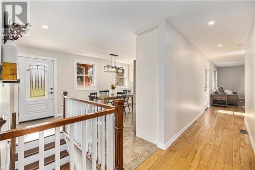 An abundance of natural light. Beautiful hardwood floors  throughout this home. - 126 Code Road, Perth, ON - Indoor Photo Showing Other Room