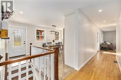 An abundance of natural light. Beautiful hardwood floors  throughout this home. - 