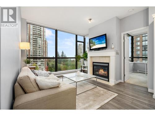 906 6837 Station Hill Drive, Burnaby, BC - Indoor Photo Showing Living Room With Fireplace