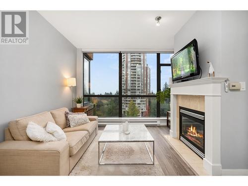 906 6837 Station Hill Drive, Burnaby, BC - Indoor Photo Showing Living Room With Fireplace