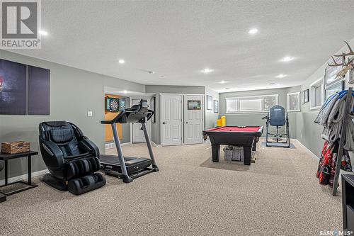 125 Ewles Place, Martensville, SK - Indoor Photo Showing Gym Room