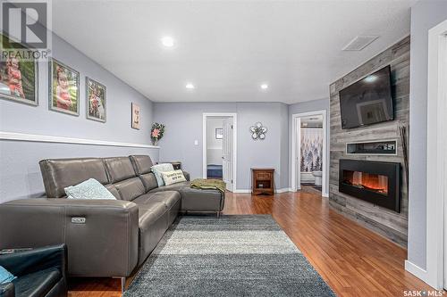 407 Armstrong Crescent, Saskatoon, SK - Indoor Photo Showing Living Room With Fireplace