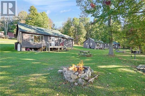 One of the 5 cottages - 538 Clear Lake Road, Elgin, ON - Outdoor With Deck Patio Veranda