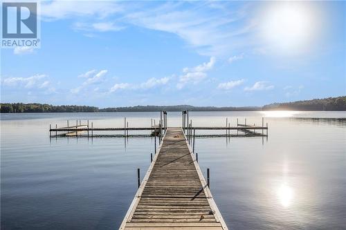 One of the many docks - 538 Clear Lake Road, Elgin, ON - Outdoor With Body Of Water With View