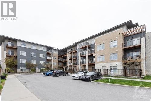 2785 Baseline Road Unit#301, Ottawa, ON - Outdoor With Balcony With Facade