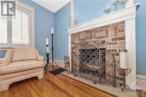 98 Harmer Avenue N, Ottawa, ON - Indoor Photo Showing Living Room With Fireplace