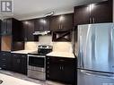 1317 8Th Avenue N, Saskatoon, SK  - Indoor Photo Showing Kitchen With Stainless Steel Kitchen 