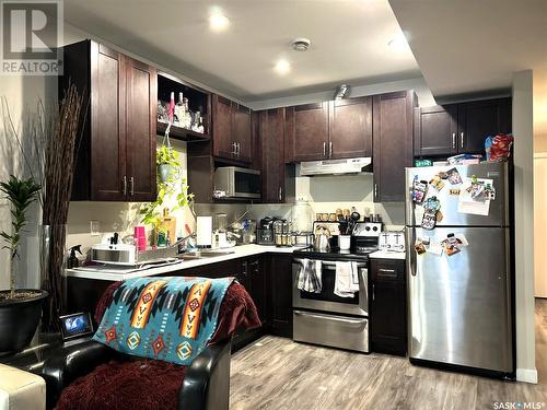 1317 8Th Avenue N, Saskatoon, SK - Indoor Photo Showing Kitchen With Stainless Steel Kitchen With Double Sink