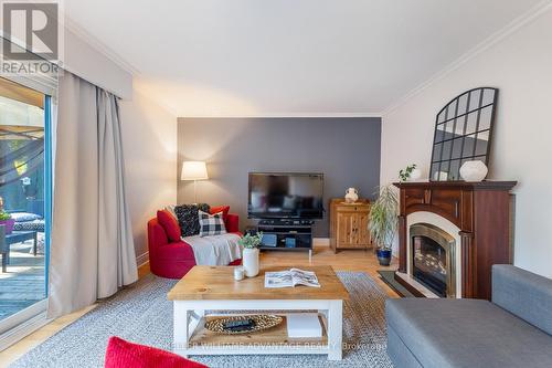 48 Gondola Crescent, Toronto, ON - Indoor Photo Showing Living Room With Fireplace