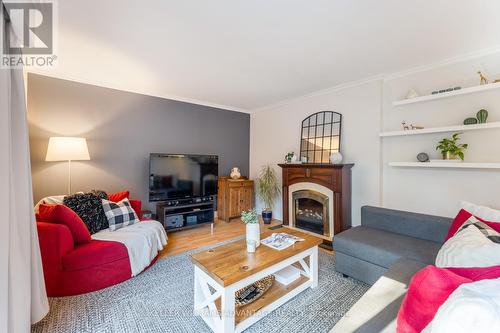 48 Gondola Crescent, Toronto, ON - Indoor Photo Showing Living Room With Fireplace