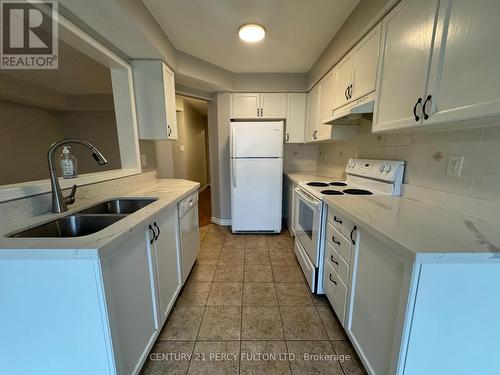 66 Tincomb Crescent, Whitby, ON - Indoor Photo Showing Kitchen With Double Sink