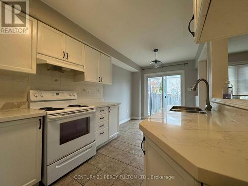 66 Tincomb Crescent, Whitby, ON - Indoor Photo Showing Kitchen With Double Sink