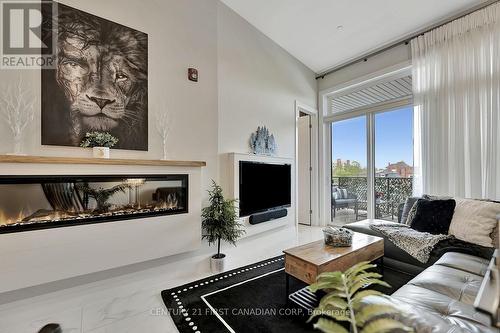 211B - 85 Morrell Street, Brantford, ON - Indoor Photo Showing Living Room With Fireplace