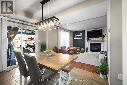 8 Meadowvale Drive, St. Thomas, ON - Indoor Photo Showing Dining Room With Fireplace