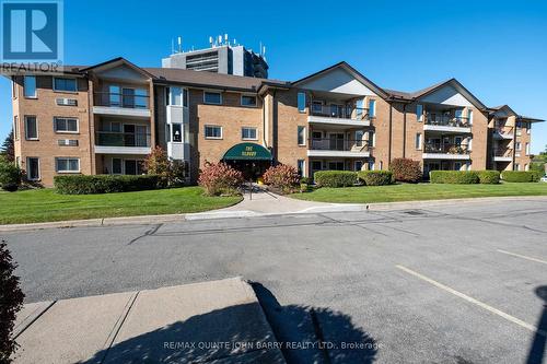 218 - 52 Tripp Boulevard, Quinte West, ON - Outdoor With Balcony With Facade