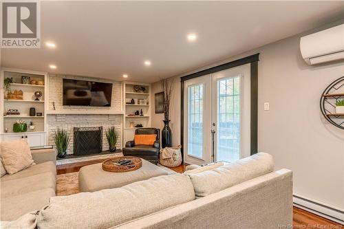 20 Galaxy, Moncton, NB - Indoor Photo Showing Living Room With Fireplace