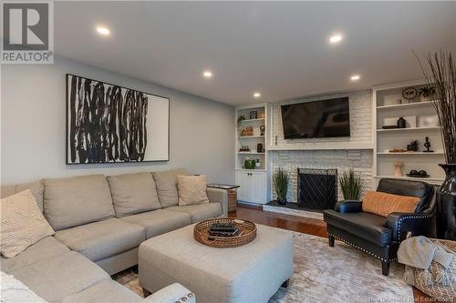 20 Galaxy, Moncton, NB - Indoor Photo Showing Living Room With Fireplace