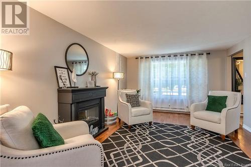 20 Galaxy, Moncton, NB - Indoor Photo Showing Living Room With Fireplace