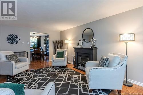 20 Galaxy, Moncton, NB - Indoor Photo Showing Living Room With Fireplace