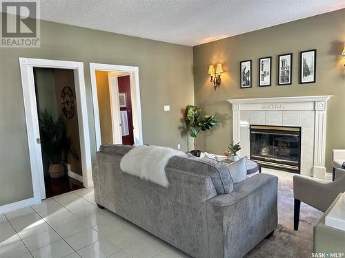 5018 Wascana Vista Court, Regina, SK - Indoor Photo Showing Living Room With Fireplace