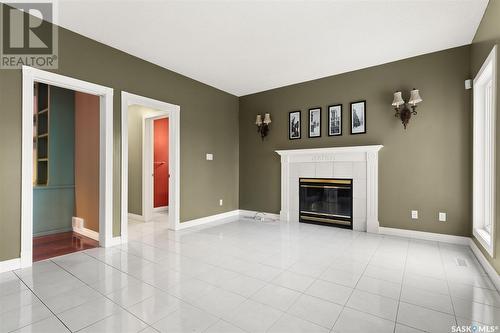 5018 Wascana Vista Court, Regina, SK - Indoor Photo Showing Living Room With Fireplace