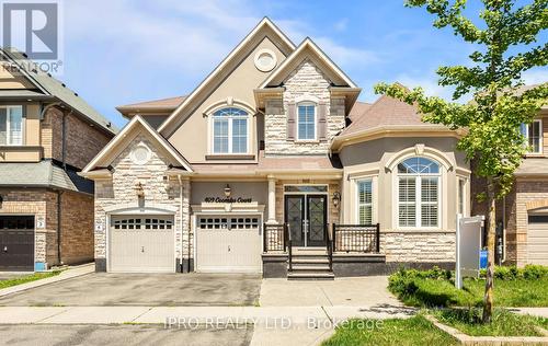 409 Coombs Court, Milton, ON - Outdoor With Facade